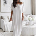 Vestido Altea blanco de corte maxi fluido con hombro asimétrico